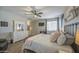 Spacious main bedroom featuring a decorative bed frame and a well-lit interior at 23781 W Mohave St, Buckeye, AZ 85326