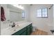 Well-lit bathroom featuring a large vanity, modern fixtures, and a clean, bright aesthetic at 238 W Myrna Ln, Tempe, AZ 85284