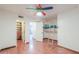 Bedroom with unique lofted bed, hardwood floors, and closet at 238 W Myrna Ln, Tempe, AZ 85284