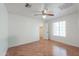 Spacious bedroom with hardwood floors and a ceiling fan at 238 W Myrna Ln, Tempe, AZ 85284