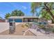 Charming single-story home with a well-manicured lawn and a welcoming entrance at 238 W Myrna Ln, Tempe, AZ 85284