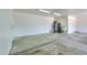 View of the garage with ample storage, a utility sink, and a door to the backyard at 238 W Myrna Ln, Tempe, AZ 85284