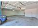 Spacious three-car garage with ample room for parking and storage and plenty of lighting at 238 W Myrna Ln, Tempe, AZ 85284