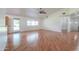 Spacious living room with hardwood floors, ceiling fan, and bright natural light at 238 W Myrna Ln, Tempe, AZ 85284