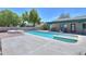 Beautiful swimming pool and spa with surrounding patio space provide a tranquil retreat at 238 W Myrna Ln, Tempe, AZ 85284