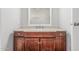 Bathroom vanity with a mirror, cabinets, and hardware at 2650 W Union Hills Dr # 245, Phoenix, AZ 85027