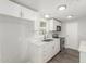 Modern white kitchen showcasing sleek countertops and stainless steel appliances at 2650 W Union Hills Dr # 245, Phoenix, AZ 85027