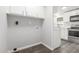 Laundry room featuring washer and dryer hookups and storage at 2650 W Union Hills Dr # 245, Phoenix, AZ 85027