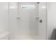 Shower with subway tile, shower head and shelving at 2650 W Union Hills Dr # 245, Phoenix, AZ 85027