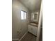 Well-lit bathroom features a granite countertop, undermount sink, and square mirror at 300 S Val Vista Dr # 51, Mesa, AZ 85204