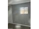 Bright bedroom with sleek flooring and a sunlit window, creating a peaceful and welcoming atmosphere at 300 S Val Vista Dr # 51, Mesa, AZ 85204