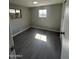 Cozy bedroom with sleek flooring and a bright window, offering a comfortable and inviting personal space at 300 S Val Vista Dr # 51, Mesa, AZ 85204