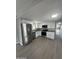 Modern kitchen with stainless steel appliances, granite countertops, and ample cabinet space, perfect for cooking and entertaining at 300 S Val Vista Dr # 51, Mesa, AZ 85204