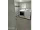 Clean laundry room with modern white washer and dryer units at 300 S Val Vista Dr # 51, Mesa, AZ 85204