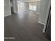 Spacious living area with updated flooring, neutral paint, and natural light, ideal for relaxing and Gathering gatherings at 300 S Val Vista Dr # 51, Mesa, AZ 85204
