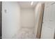 Unfinished room showcases concrete floors and door stack for easy updates at 3021 E Windrose Dr, Phoenix, AZ 85032