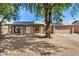 Charming home with solar panels and a well-manicured front yard at 308 W Oraibi Dr, Phoenix, AZ 85027