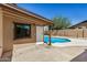 Backyard entrance to a refreshing pool, perfect for hot days at 308 W Oraibi Dr, Phoenix, AZ 85027