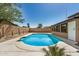 Inviting backyard pool with custom patio surround, perfect for relaxation and entertaining at 308 W Oraibi Dr, Phoenix, AZ 85027