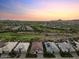Stunning aerial view of desert homes, with golf course and mountain views at 31210 N 122Nd Ln, Peoria, AZ 85383