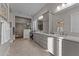 Spacious bathroom featuring a walk-in shower, dual vanities, and lots of storage at 31210 N 122Nd Ln, Peoria, AZ 85383