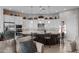 Beautiful kitchen featuring a large island with seating, stainless steel appliances, and ample counter space at 31210 N 122Nd Ln, Peoria, AZ 85383
