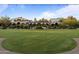 Spacious lawn with beautiful landscaping, arched buildings, and great architecture at 31210 N 122Nd Ln, Peoria, AZ 85383