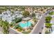 An aerial perspective of neighborhood community pool, complete with palm trees and various plant life at 3389 W Barcelona Dr, Chandler, AZ 85226