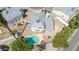 Aerial view of a home's backyard with a private pool, patio, and desert landscaping at 3389 W Barcelona Dr, Chandler, AZ 85226