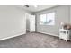 Bright bedroom features neutral walls, soft carpeting, large window and a door leading to closet at 3389 W Barcelona Dr, Chandler, AZ 85226