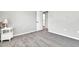 This cozy bedroom features neutral walls, soft carpeting, and a door leading to the ensuite bathroom at 3389 W Barcelona Dr, Chandler, AZ 85226