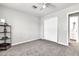 Neutral bedroom features soft carpeting, large closet, and a door leading to the ensuite bathroom at 3389 W Barcelona Dr, Chandler, AZ 85226