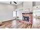 A brick fireplace and open room at 3389 W Barcelona Dr, Chandler, AZ 85226