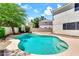 Relaxing backyard pool with lush trees, a great place to beat the heat at 3389 W Barcelona Dr, Chandler, AZ 85226