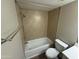 Well-maintained bathroom with a shower-tub combination and tiled surround at 3434 W Danbury Dr # A206, Phoenix, AZ 85053