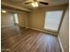 Charming bedroom offers ample space, wood floors, large closet and natural light at 3434 W Danbury Dr # A206, Phoenix, AZ 85053