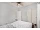 Bedroom with a ceiling fan and a double door closet at 3685 N 141St Dr, Goodyear, AZ 85395