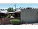 Exterior view of single-story home showing desert landscaping, block construction, and covered patio at 411 W Colter St # A, Phoenix, AZ 85013