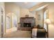 Comfortable living space with a decorative fireplace and plush seating at 4136 E Greenway Cir, Mesa, AZ 85205