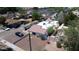 Aerial view of a cozy home showcasing its red tile roof and proximity to neighboring residences at 42 E 2Nd Ave, Mesa, AZ 85210