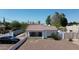 Charming single-Gathering home with red tile roof and low rock landscaping in a residential neighborhood at 42 E 2Nd Ave, Mesa, AZ 85210