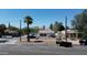Quaint home featuring a red tile roof, located in a diverse neighborhood setting at 42 E 2Nd Ave, Mesa, AZ 85210