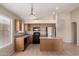 Spacious kitchen equipped with modern appliances, an island, and plenty of storage at 42196 W Chisholm Dr, Maricopa, AZ 85138