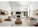 Inviting living room with fireplace, modern furniture, and natural light at 4434 E Camelback Rd # 132, Phoenix, AZ 85018