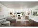 Bright and open living room with fireplace, modern furniture, and hardwood floors at 4434 E Camelback Rd # 132, Phoenix, AZ 85018