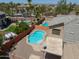 Picture of a private backyard featuring a sparkling pool and well maintained desert landscaping at 45113 W Buckhorn Trl, Maricopa, AZ 85139