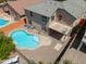 View of a home highlighting the backyard pool and patio area perfect for enjoying the outdoors at 45113 W Buckhorn Trl, Maricopa, AZ 85139