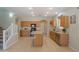 Well-lit kitchen with breakfast bar and stainless appliances at 45113 W Buckhorn Trl, Maricopa, AZ 85139