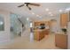 Bright kitchen with central island and open layout at 45113 W Buckhorn Trl, Maricopa, AZ 85139