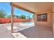 A private pool surrounded by landscaping at 45113 W Buckhorn Trl, Maricopa, AZ 85139